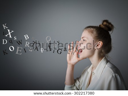 Young woman is screaming at something. Young slim woman. Royalty-Free Stock Photo #302217380