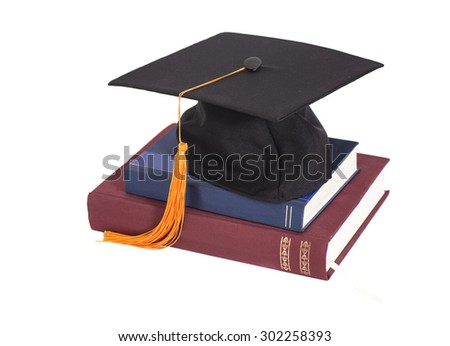 Graduation Cap On stuck of Books isolated Royalty-Free Stock Photo #302258393