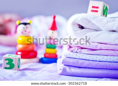 baby linen on the bed