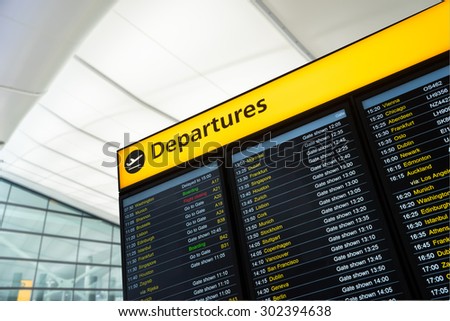 Flight information, arrival, departure at the airport, London, England Royalty-Free Stock Photo #302394638
