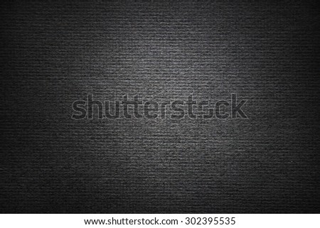 Closeup of dark textured background 