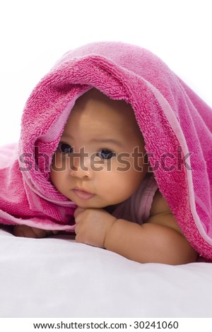 Cute baby in the towel on white background