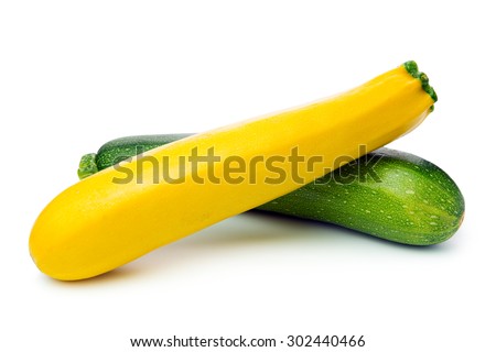 Fresh yellow and green zucchini on white background Royalty-Free Stock Photo #302440466