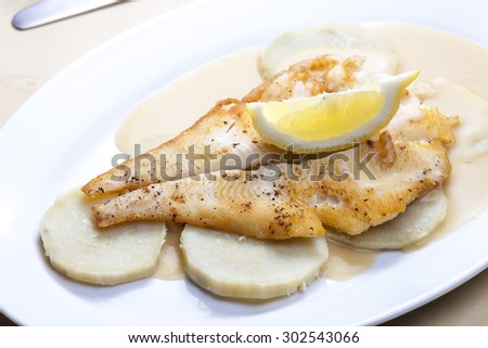 fried halibut with sweet potatoes and lemon sauce