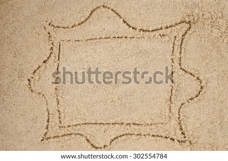 empty frame drawing on sand