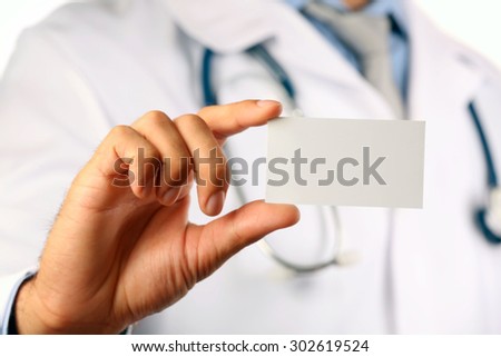 Doctor with blank badge, closeup
