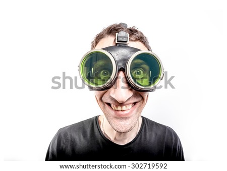 Happy nerdy guy in green vintage goggles.