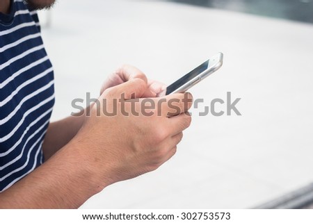 close up people play cellular mobile device for working or read news concept