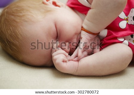 photo of cute sleeping  newborn baby indoors