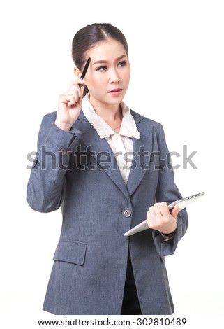 asian business women working with digital tablet. She is thinking about new project. shot on white background