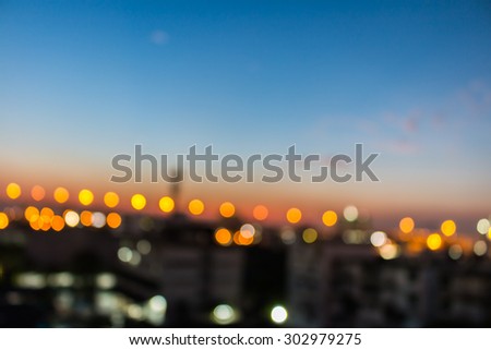 bokeh of city and bridge before sunset background