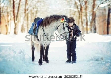 Horse and Jockey - Little child boy and  pony