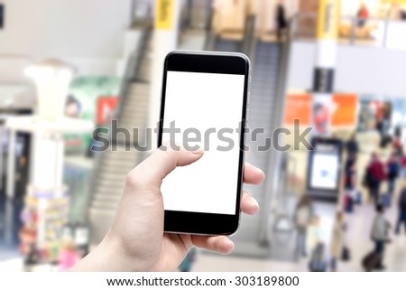 smartphone in hand with a blank screen and the crowd in the background
