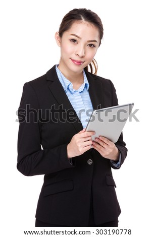 Businesswoman use of tablet pc