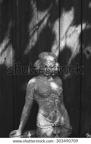 Black and white photograph of a statue