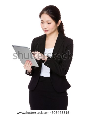 Asian young businesswoman use of tablet pc