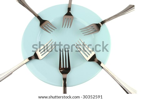 six forks on blue dish