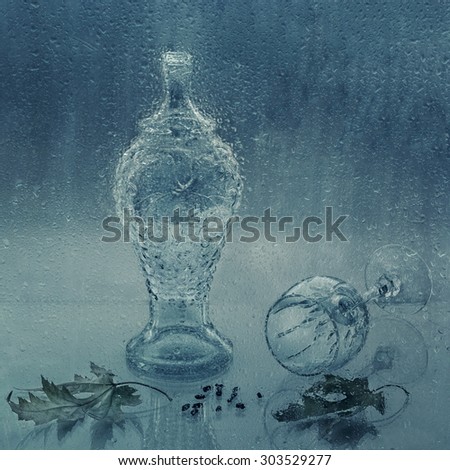 Still life with glass on the wet glass