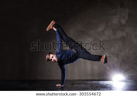Young attractive man dancing