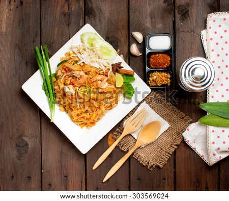 Thailand style noodles, stir-fried rice noodles (Pad Thai) Royalty-Free Stock Photo #303569024