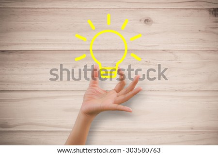 Woman handle idea with wooden background