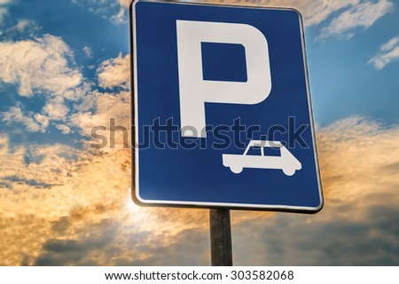 road sign Parking area or Rest stop against the evening sky