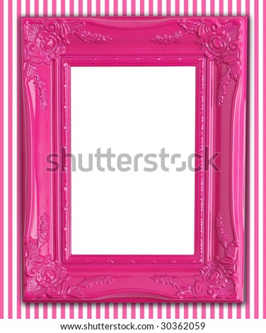 Pretty pink picture frame on pink striped wallpaper.