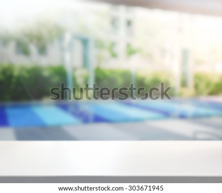 Wood Table Top Of Background And Pool