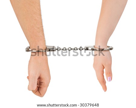 Man and woman hands and handcuffs isolated on white background