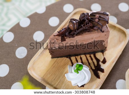 Picture of Chocolate Cake On Wooden Plate
