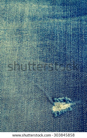 Background from a jeans fabric with a place for an inscription