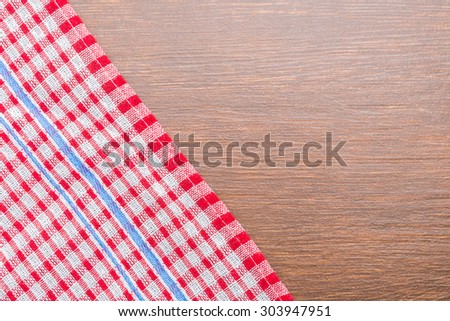 Tablecloth on wooden background with copy space