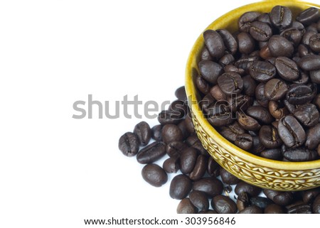 Coffee Beans in cup on white background