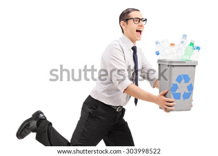 Joyful man running with a recycle bin in his hands isolated on white