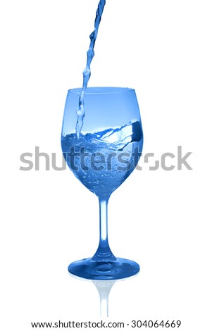 pouring water on a glass on white background
