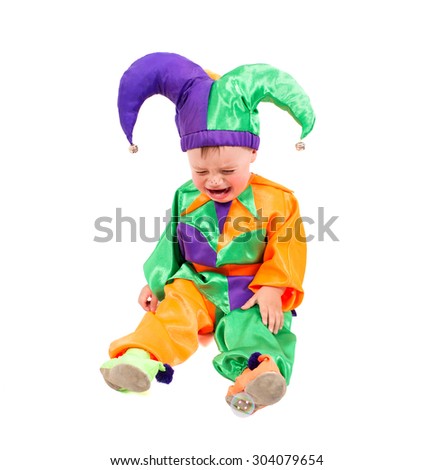 capricious child dressed in carnival costume fantastic character parsley. shot in studio.