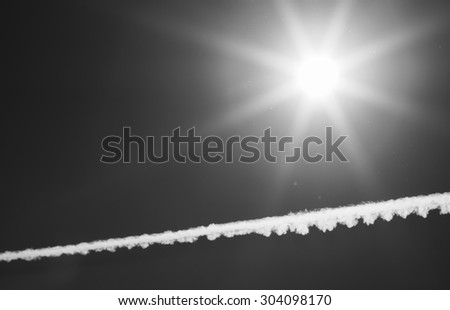 Horizontal black and white jet flight trace background