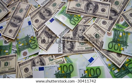 background from chaotically lyings one hundred banknotes