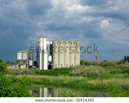 factory and silos on the river