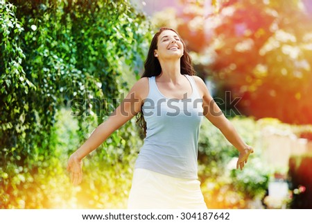 Picture of a beautiful young woman enjoying the summer
