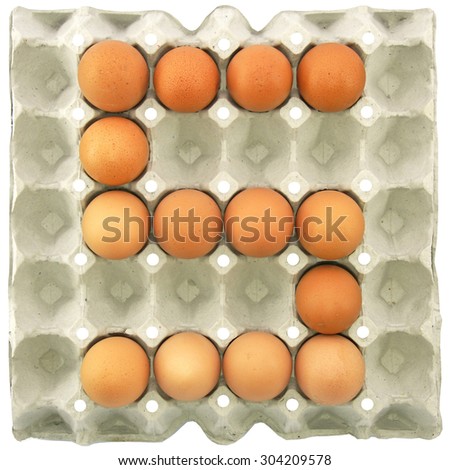 Number five of eggs in the paper package tray