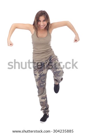 pretty teen girl demonstrating her muscles