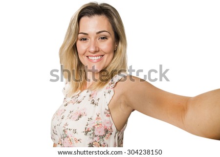 Young pretty fashion blonde woman taking self shot photo