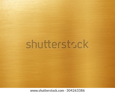 Shiny yellow leaf gold foil texture background Royalty-Free Stock Photo #304263386