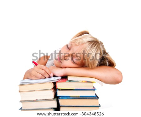 Back to school. Tired Schoolgirl sleeping on a stack of books isolated on a white background. Education concept, knowledge. School girl, pupil