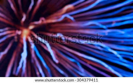 blurred image of Blurred lights,Big bright round defocused colored lights on black background