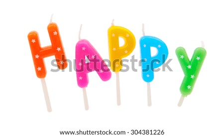 Letters cake colored candles isolated on white background