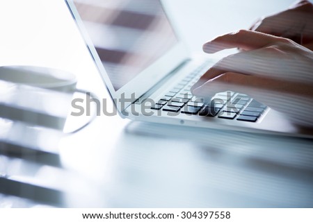 Close-up of hands of business man. View through blinds Royalty-Free Stock Photo #304397558