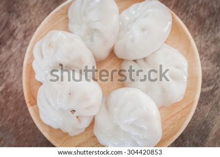 Chinese leek steamed dessert on wooden table, stock photo