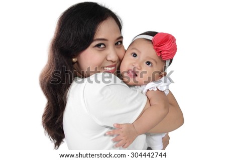 Happy Asian mother hugging her cute baby daughter, isolated on white background